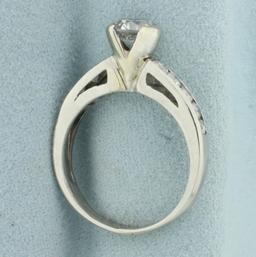 Unique Half Bezel Diamond Engagement Ring In Platinum
