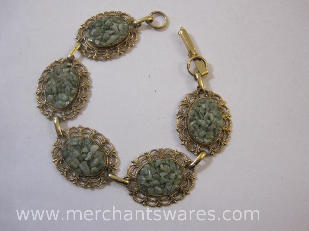 Assorted Gold Tone Costume Jewelry including heart and flower pins, solid copper and stone bracelet