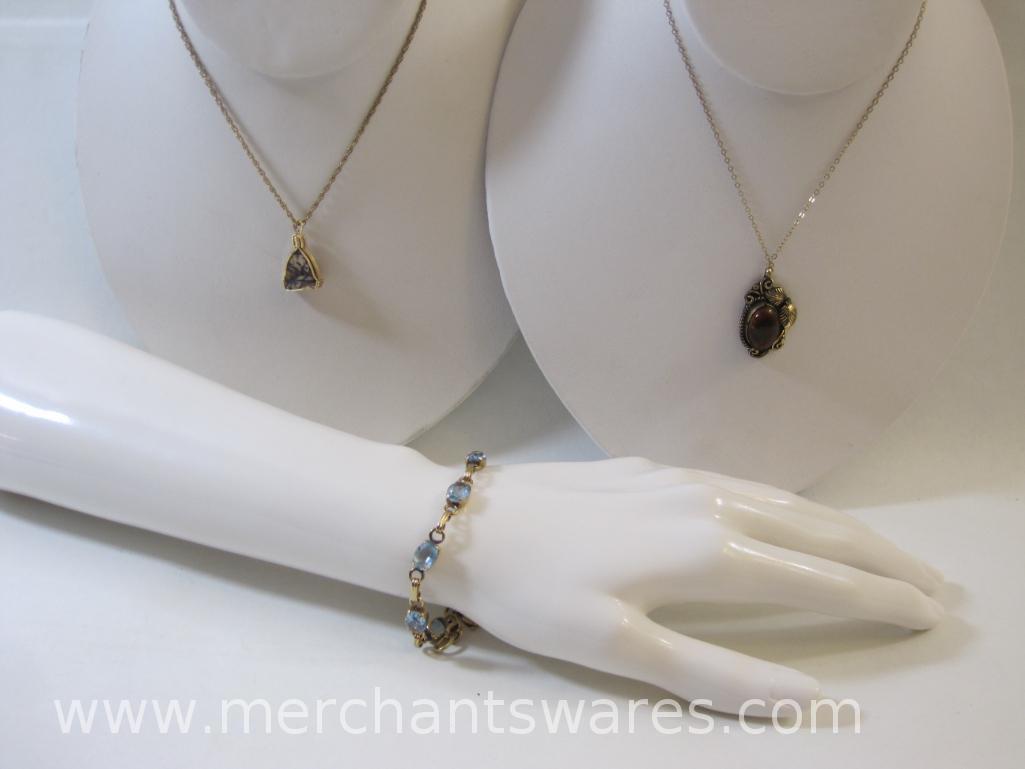 Gold Filled Jewelry including two necklaces, bracelet with blue gemstones and clip-on clasp