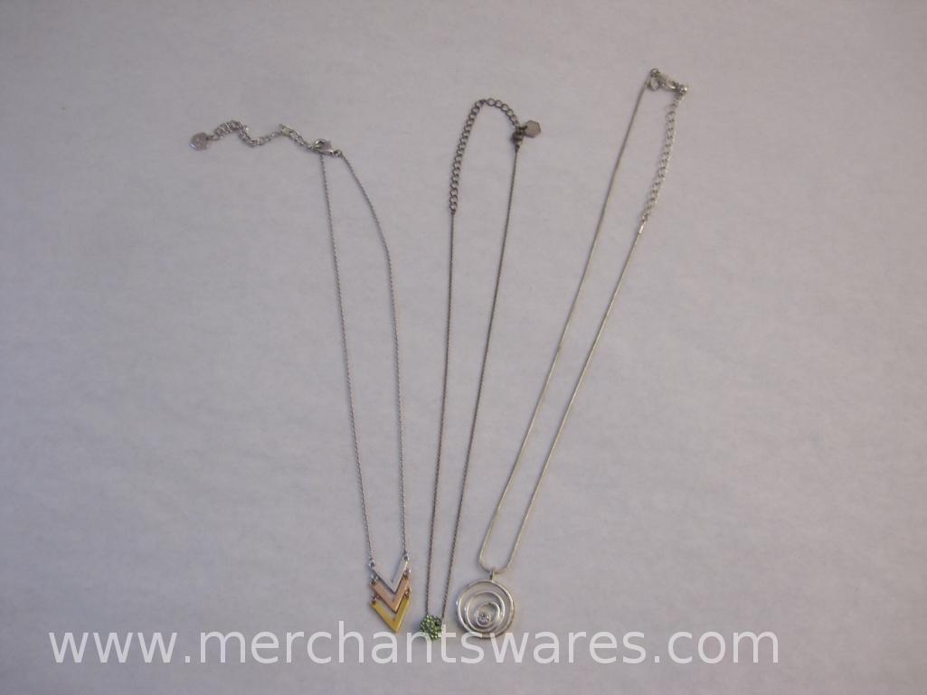 Three Silver Tone Necklaces with Pendants