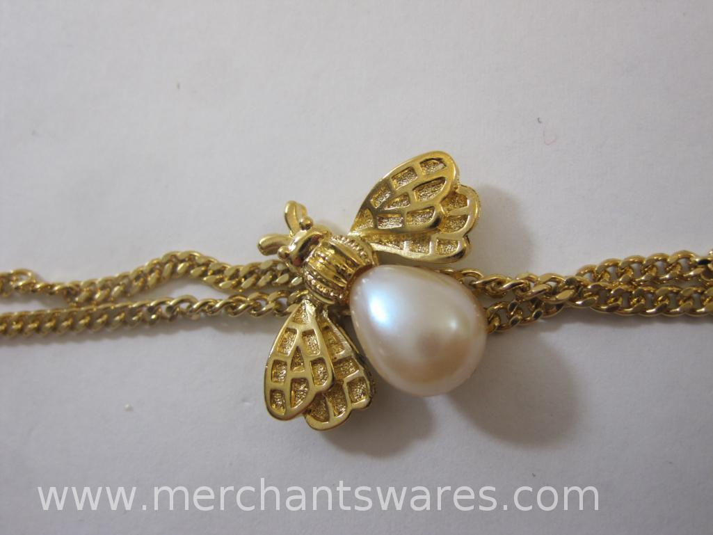 Two Gold Tone and Faux Pearl Necklaces including Leaves and Bee