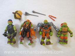 Four Michelangelo Teenage Mutant Ninja Turtles Action Figures including 2015 Mutations Aerial Attack