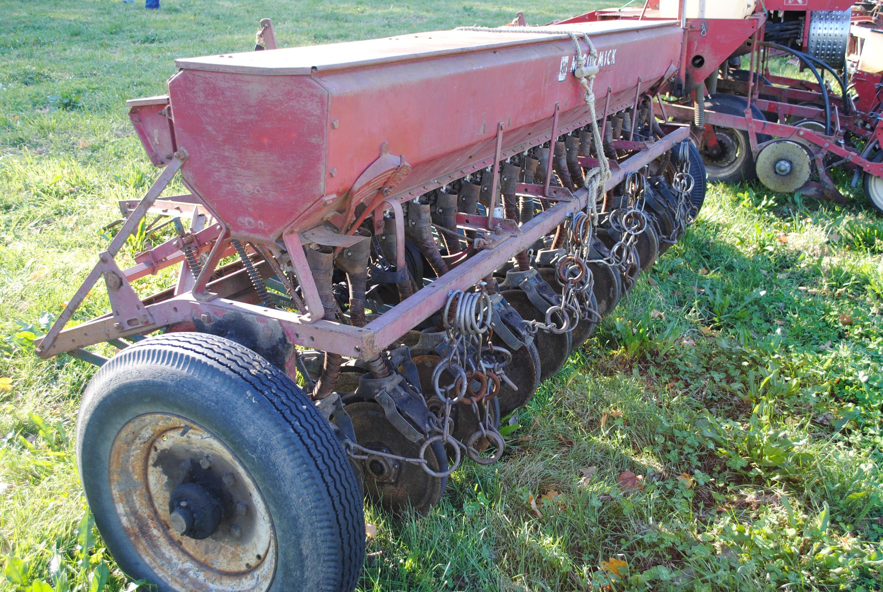McCormick grain drill, double disc, low rubber with grass attachments, 10', been used & works good,
