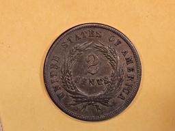 1864 Two Cent piece in About Uncirculated Plus