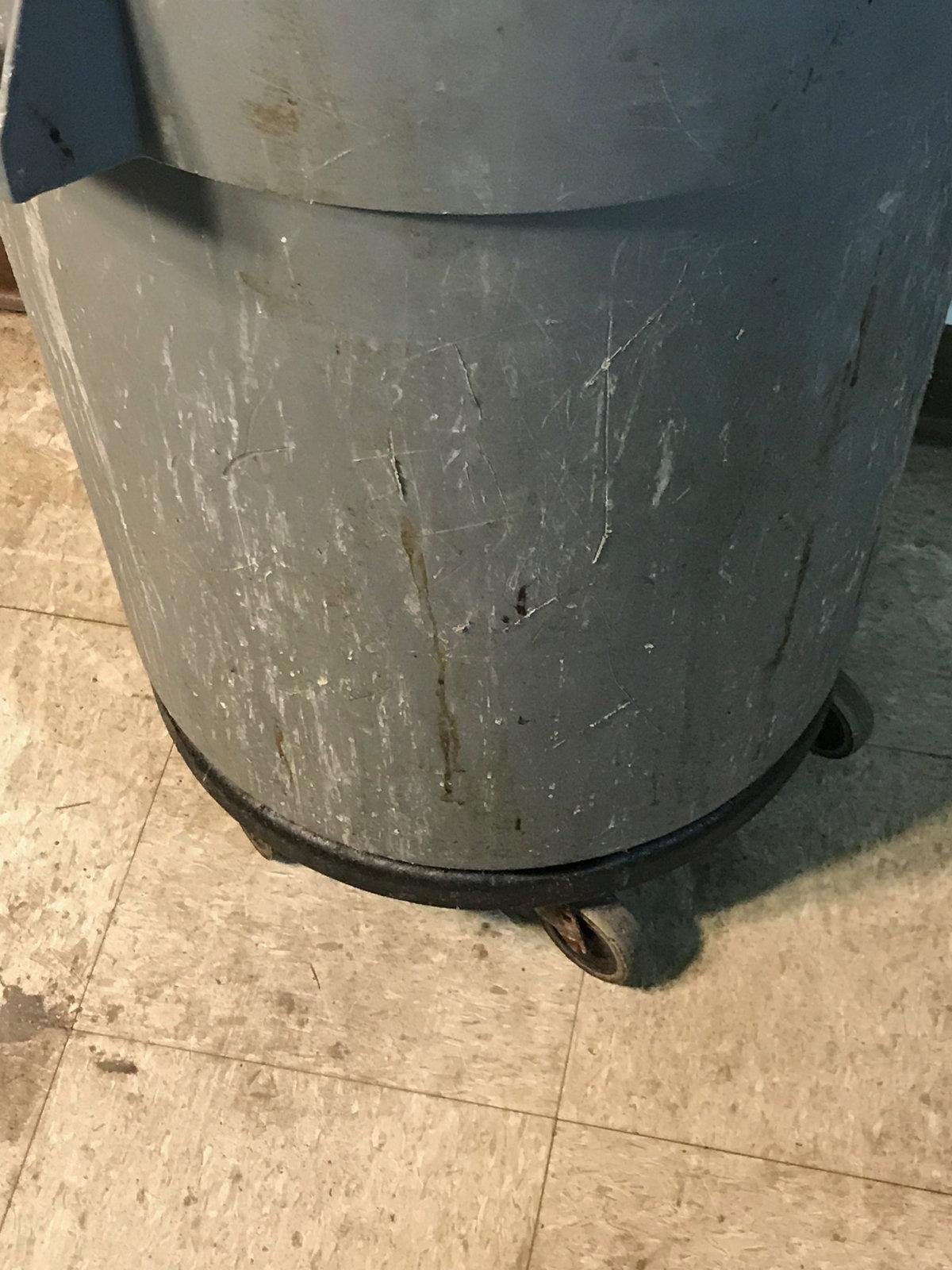 Commercial trash can on caster base