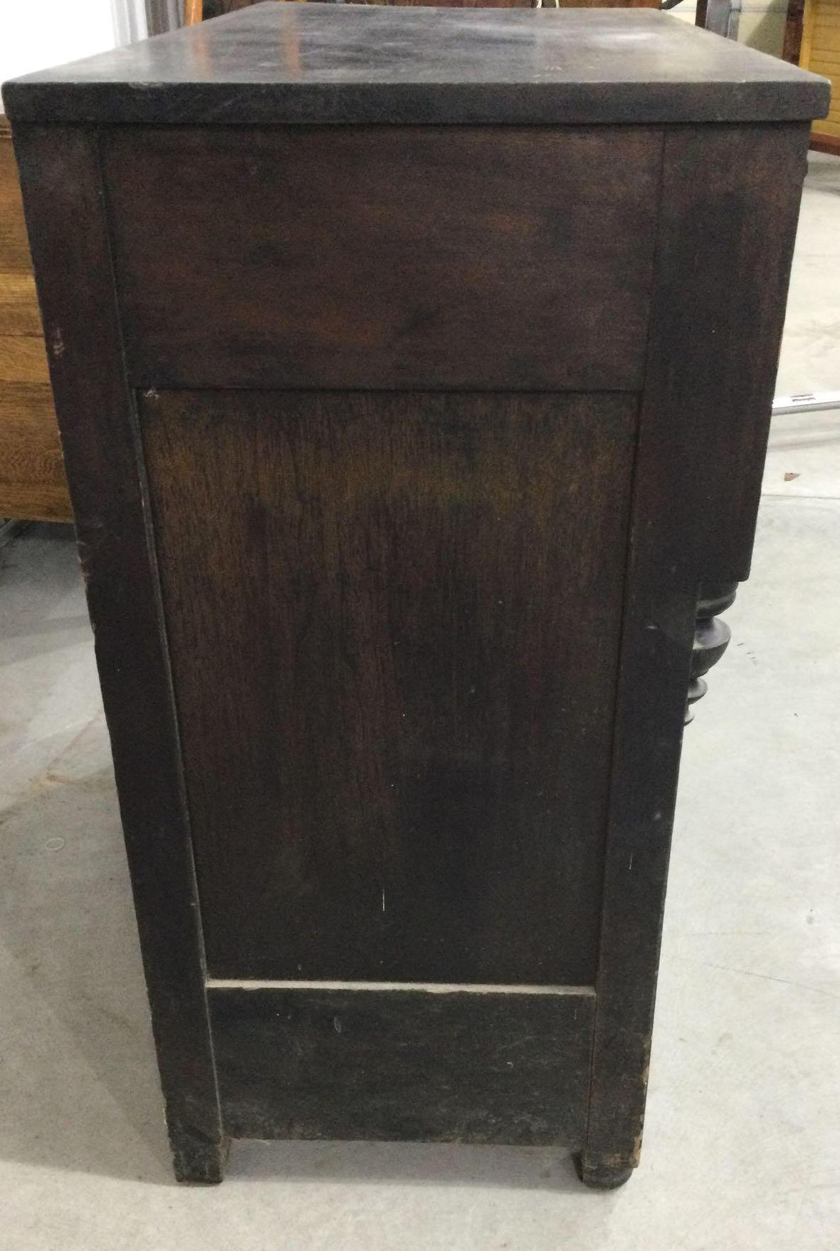 Antique black empire style antique dresser