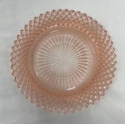 Four vintage pieces of pink depression glass