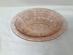 Two vintage pink depression bowls