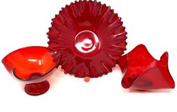 Three vintage red glass dishes