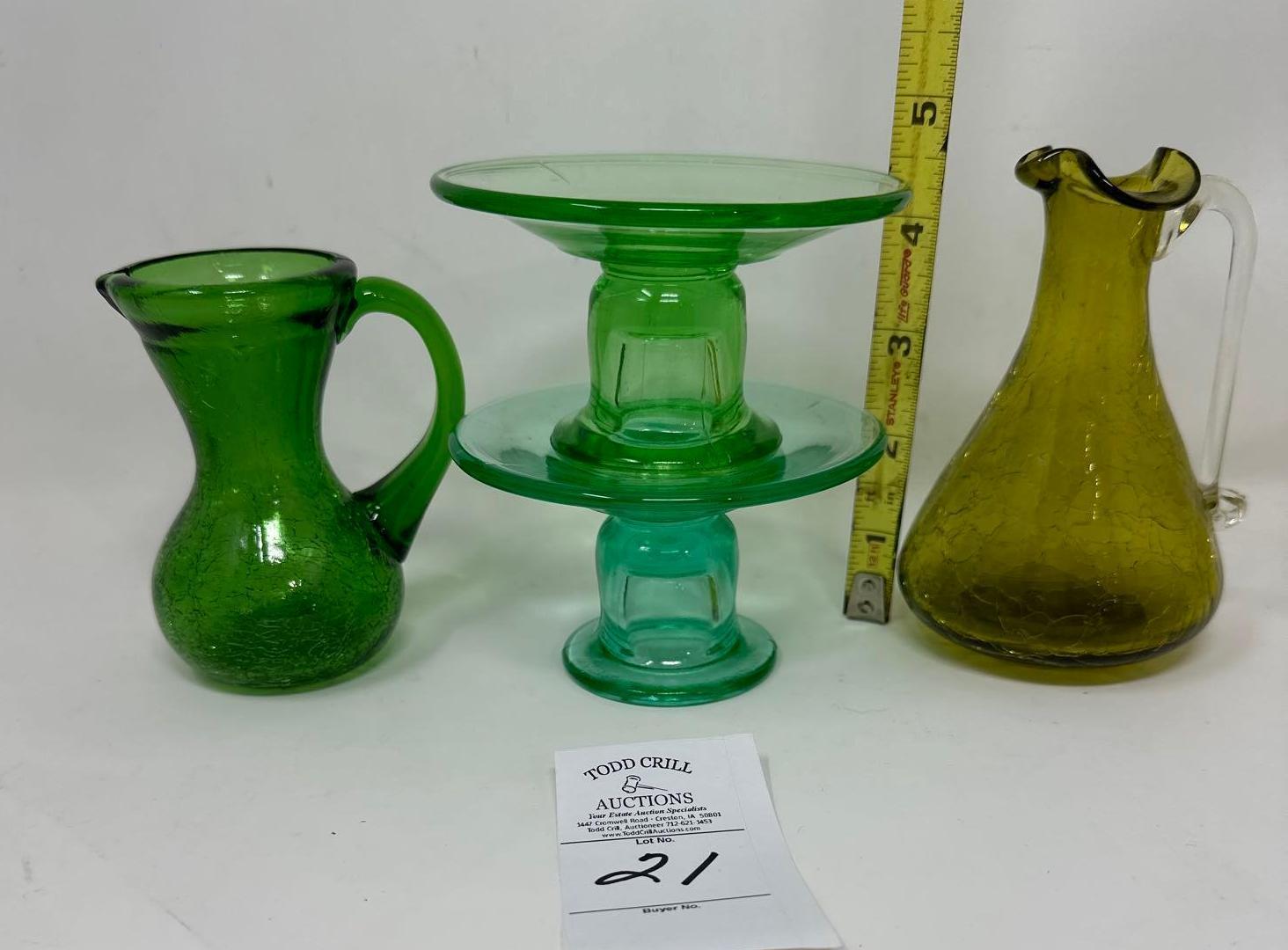 Two small vintage pitchers and uranium glass candleholders