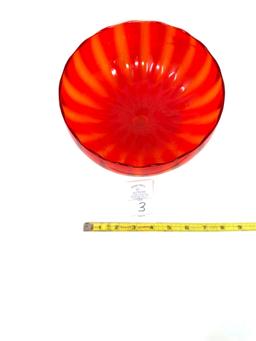 Vintage red and orange candy dish on a clear stem