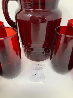 Vintage red pitcher and eight glasses