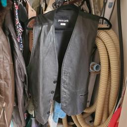 Hallway closet contents chaps leather jackets @ farm