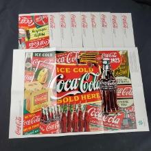 9 vintage Coc-Cola posters
