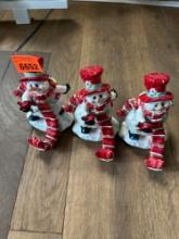 three snowman christmas decor stocking holder