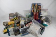 Box of miscellaneous hunting, camping and fishing items.