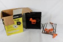 One metal pellet trap and four small metal 22 animal silhouette shooting targets. Used.