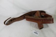 Leather ammo belt and leather right handed snap revolver holster for 3". Used
