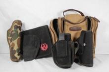 Two nylon holsters, and two nylon bags.