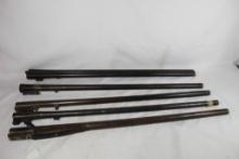 Four single shot shotgun barrels and one double barrel SS. Used.
