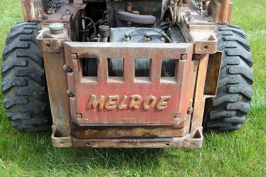 Melroe Bobcat M-610 skid loader w/ 4 cyl gas engine, 60" materials bucket & manure fork bucket , is 