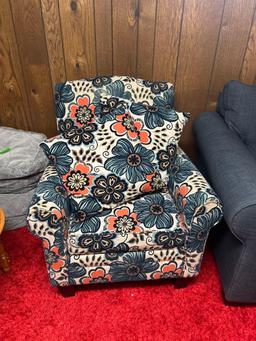 flowered print chair in basement