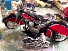 Indian and Harley motorcycle models in kitchen