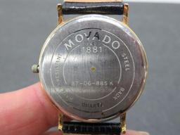 Movado Black Dial Calendar wristwatch, Swiss Quartz 33 mm Gold Tone