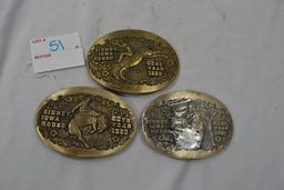 The Sydney Iowa Rodeo 1983, 1985, and 1986 Belt Buckles