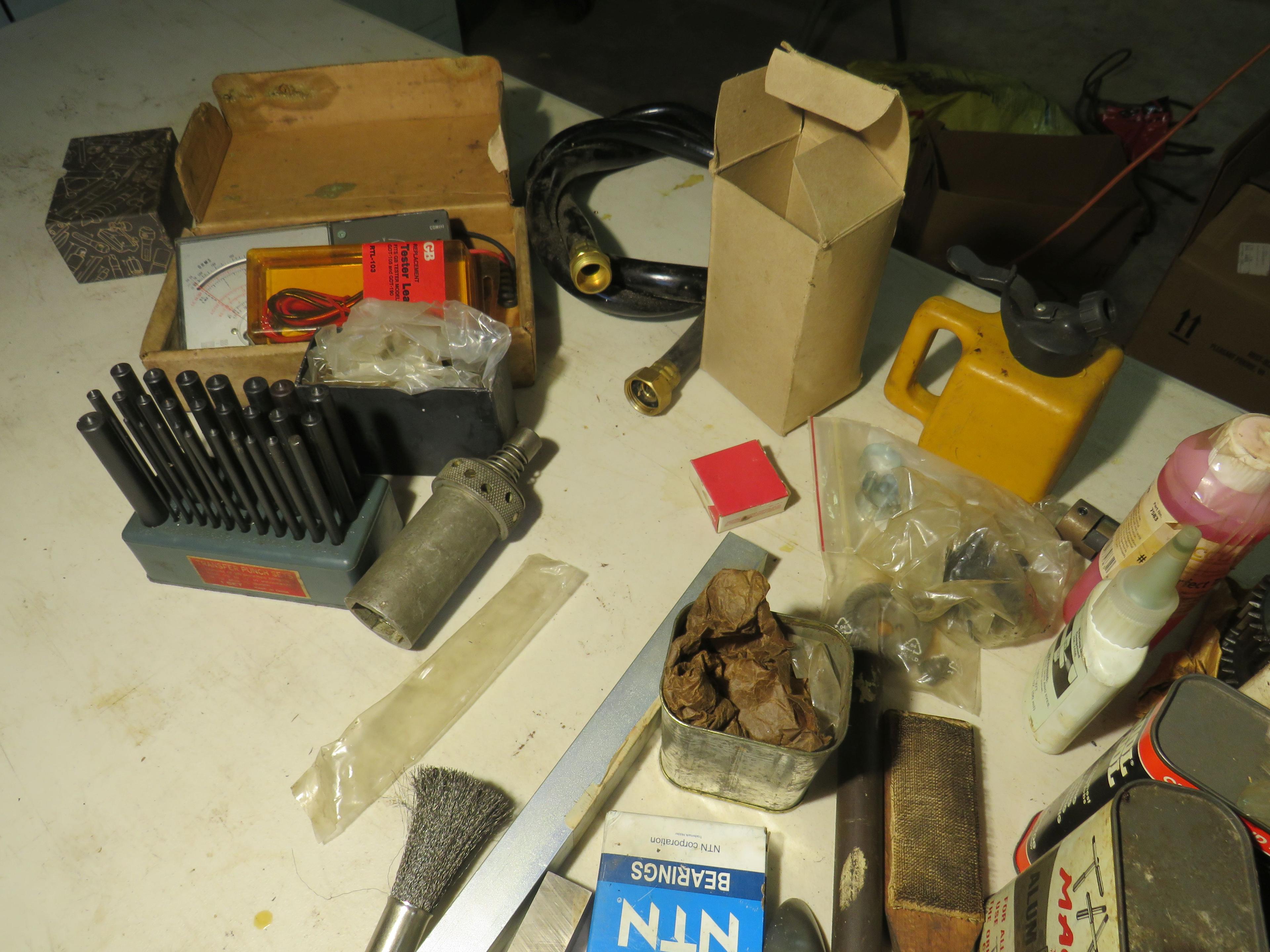 Assorted lubricants, inspection tools, multimeter, and misc. items