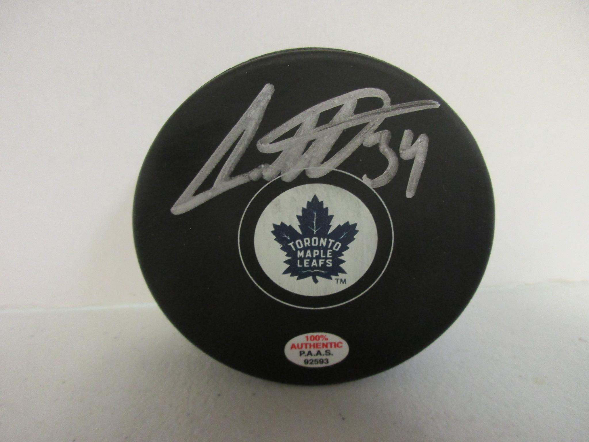 Auston Matthews of the Toronto Maple Leafs signed autographed logo hockey puck PAAS COA 593
