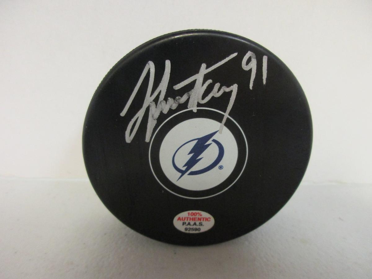 Steven Stamkos of the Tampa Bay Lightning signed autographed logo hockey puck PAAS COA 590
