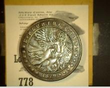 1879 Fantasy Morgan Dollar with Sexy Angel, stored in a flip.