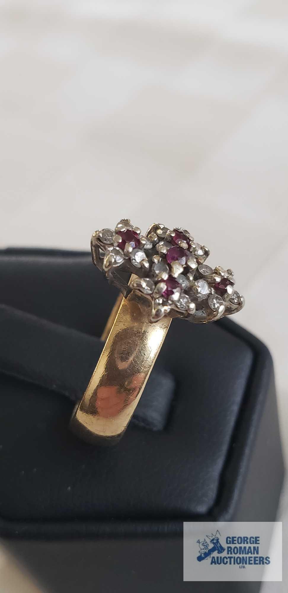 Gold colored ring with red and clear gemstones, marked CEMCO 14K, total weight approximately 4.92 G