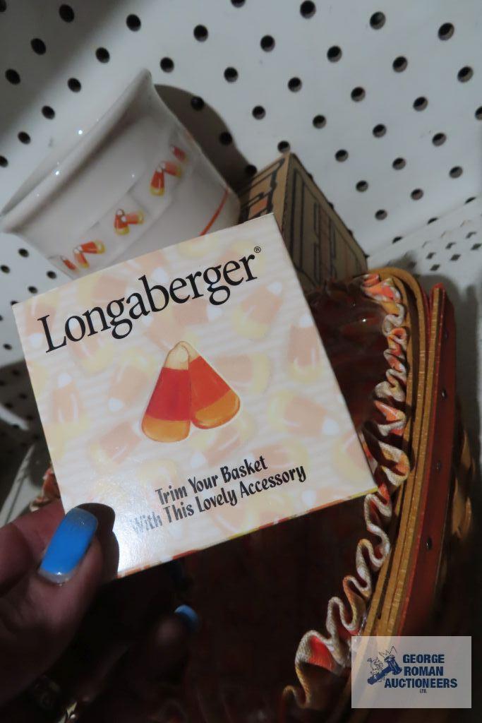 Longaberger...(2) candy corn baskets and pottery