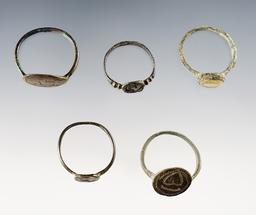 Set of 5 Trade Rings, one with a glass bezel. Townley Reed Site, Geneva, New York.