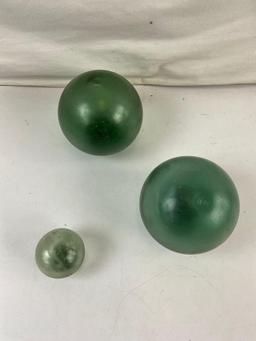 3 pcs Antique Japanese Green Glass Fish Net Floats. Largest Measures 4.5" Around. See pics.