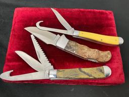 Trio of Elk Ridge Folding Pocket Knives, Single Blade, Double Blade w/ Guthook, Triple Blade w/ Saw