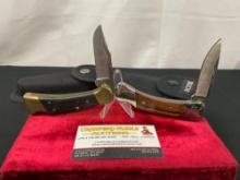 Pair of Vintage Buck Folding Knives, models 112 & 500 marked BSA on bolster, w/ cases