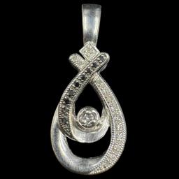 Estate sterling silver diamond pendant