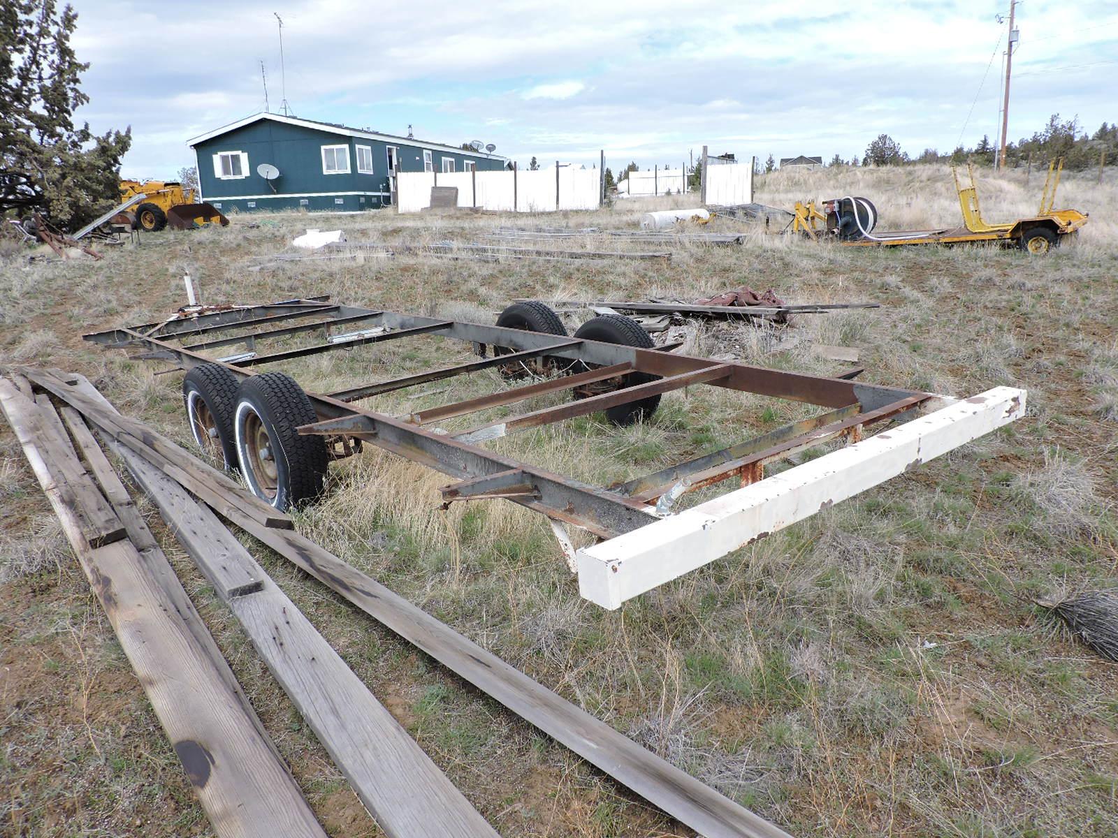 Tandem-Axle Flatbed Trailer Frame / 4 Tires have Tall Tread