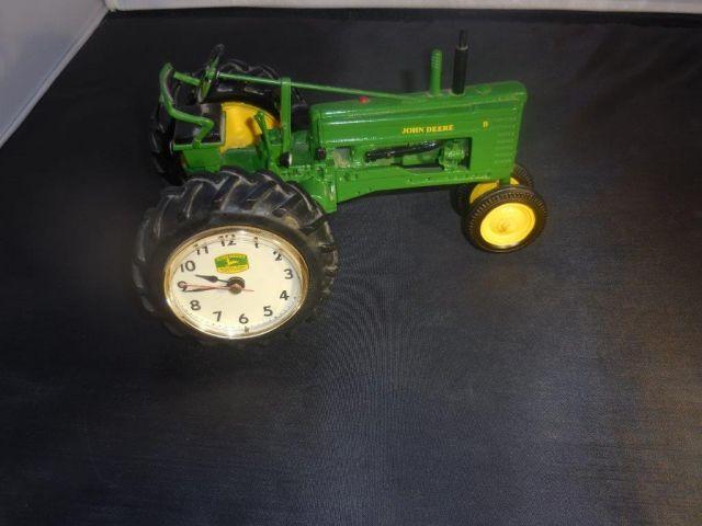 J.D. 1/16 tractor w/clock in wheel
