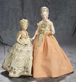 14" and 11" German bisque half-dolls with jointed arms. $400/700