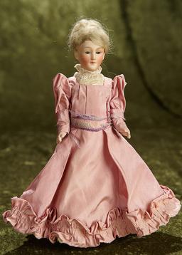 9" German bisque lady doll, model 300, with closed mouth and original flapper body. $300/400