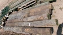 3 PALLETS: TOTAL  OF 25 8' WOOD POSTS   (your bid x 25 )