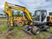 WACKER 6503-2 RUBBER TIRED EXCAVATOR SN:719 powered by diesel engine, equipped with Cab, front