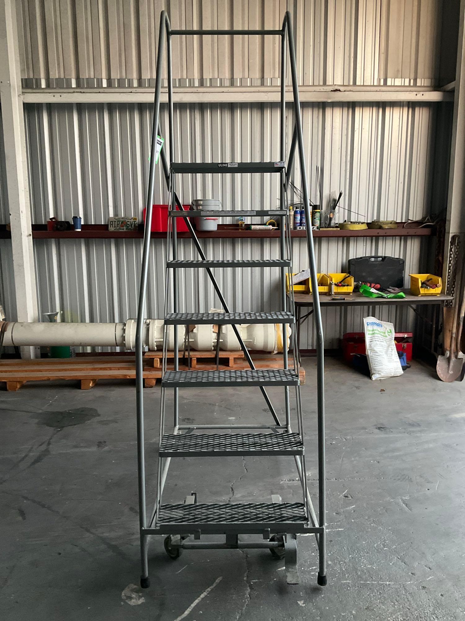 ULINE...SAFETY LADDER WITH WHEELS , APPROX 100? T