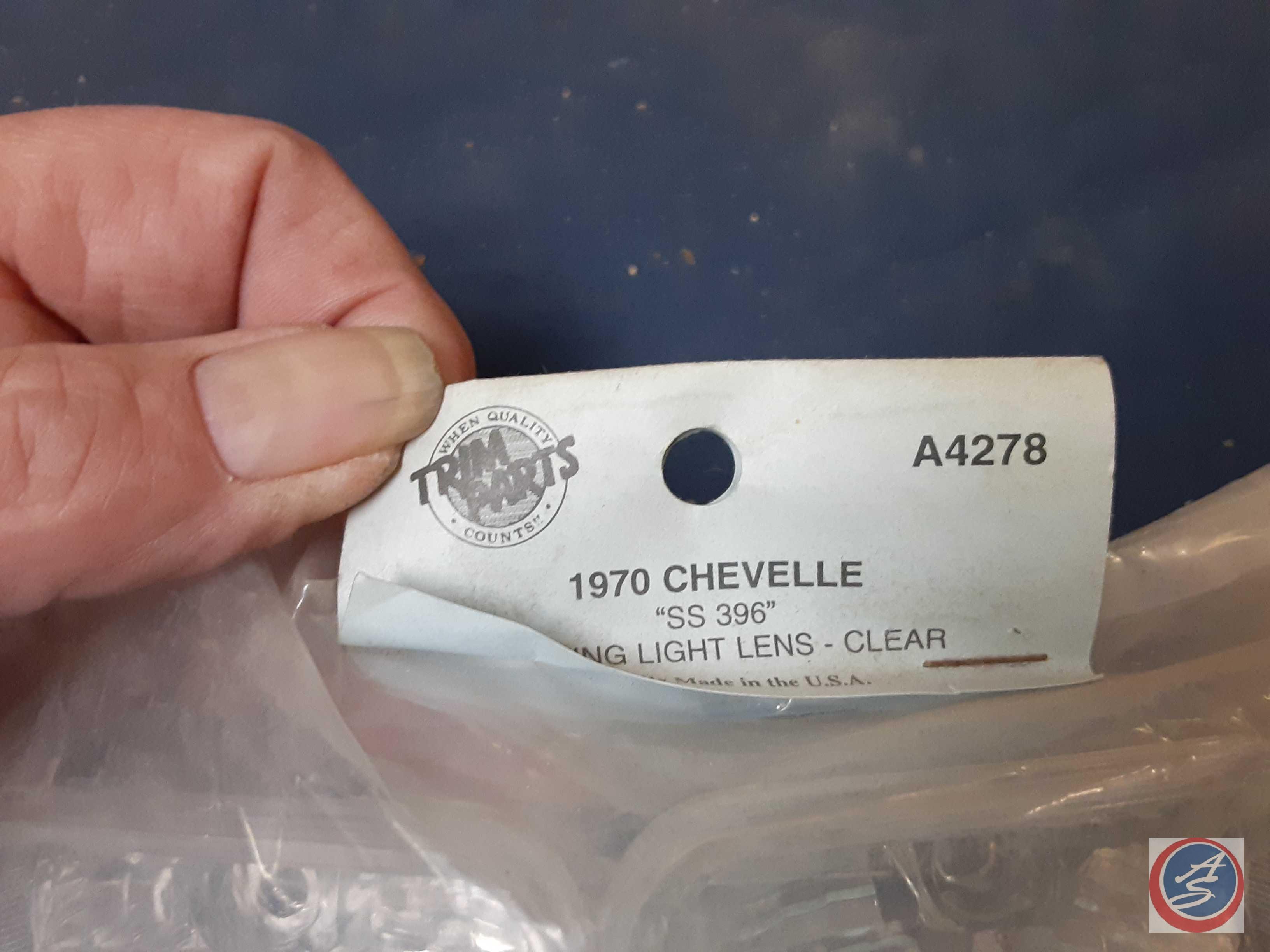 Assortment of Chevrolet Trunk Emblems, Trim Parts Parking Light Lens 1970 Chevelle 'SS 396' - A4278,
