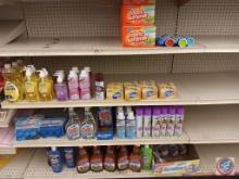 Variety of cleaning supplies: shaving cream, dish soap, carpet freshener, and fabric softener sheets