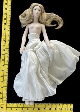 (1) 15 1/2” Porcelain Doll and (1) 18 1/2”